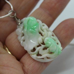 Carved jade pendant